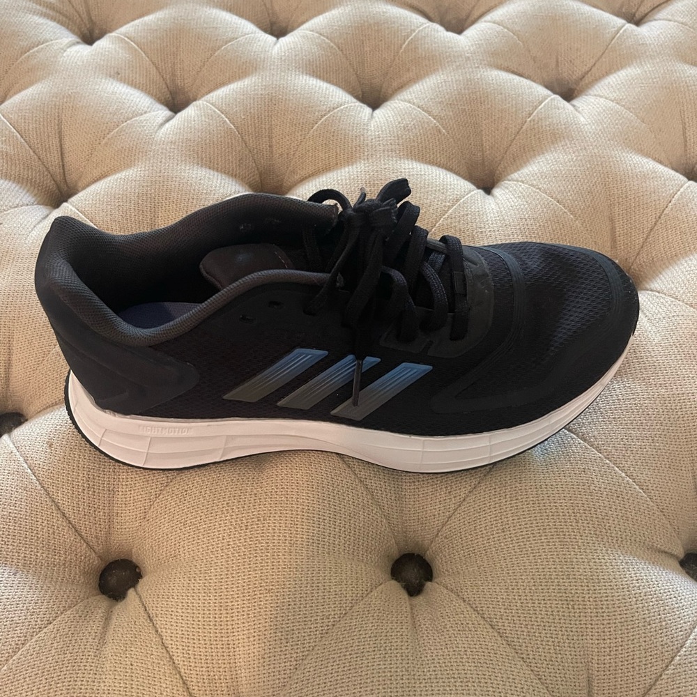 Women’s Black Adidas Duramo Athletic Running Shoe with White Sole